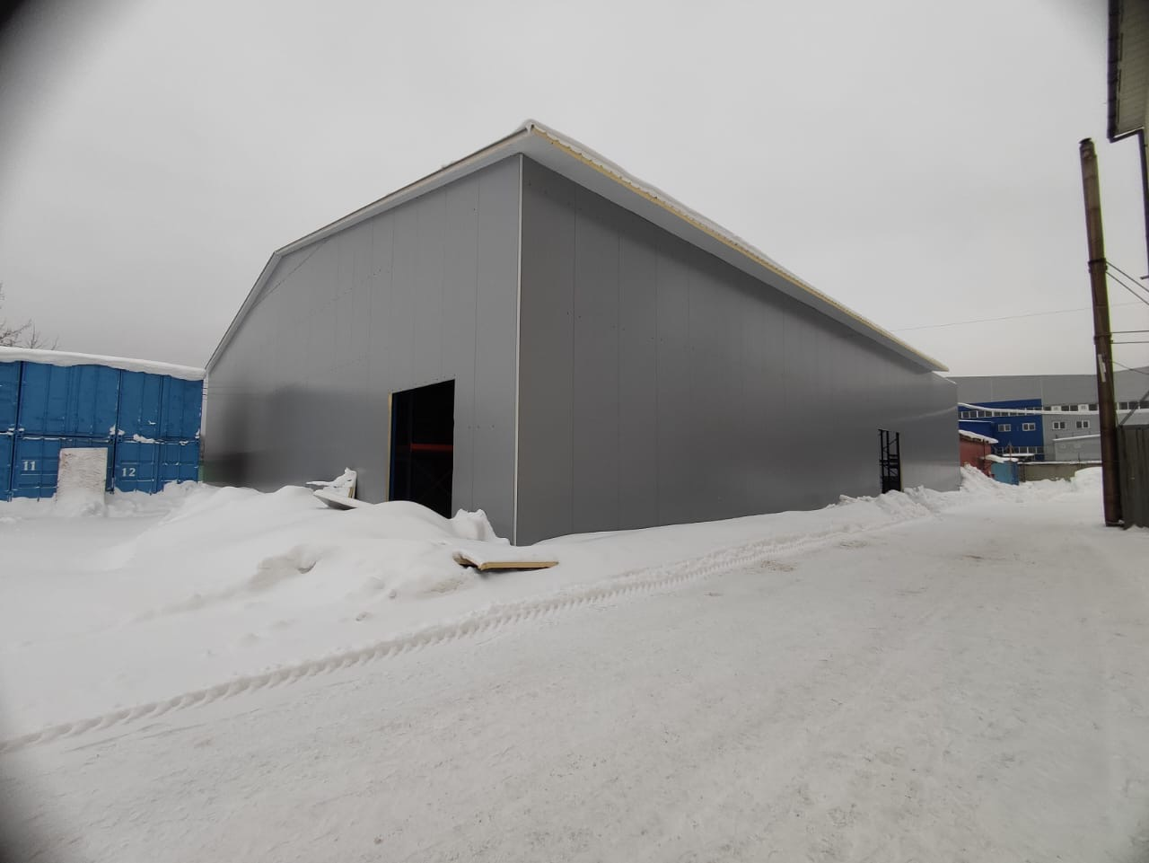 Установка сэндвич-панелей на снс склад